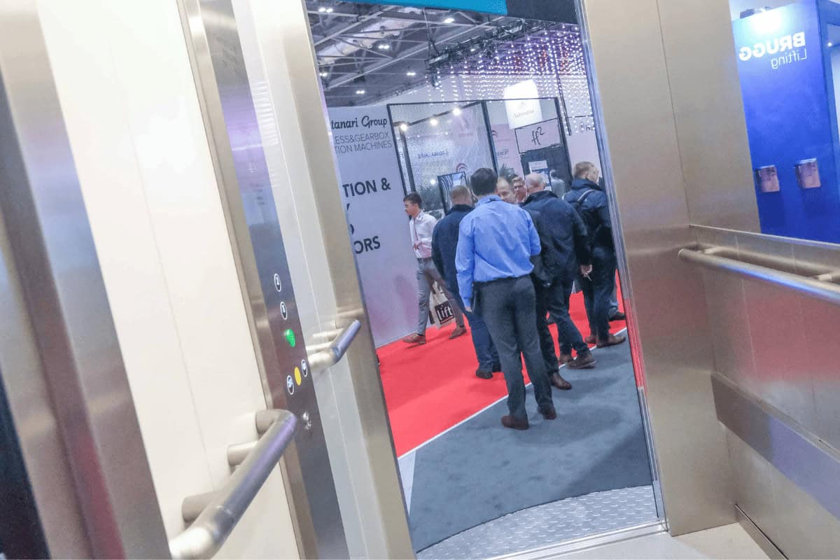 Liftex Speaker Spotlight Template (3) A group of people standing in an elevator