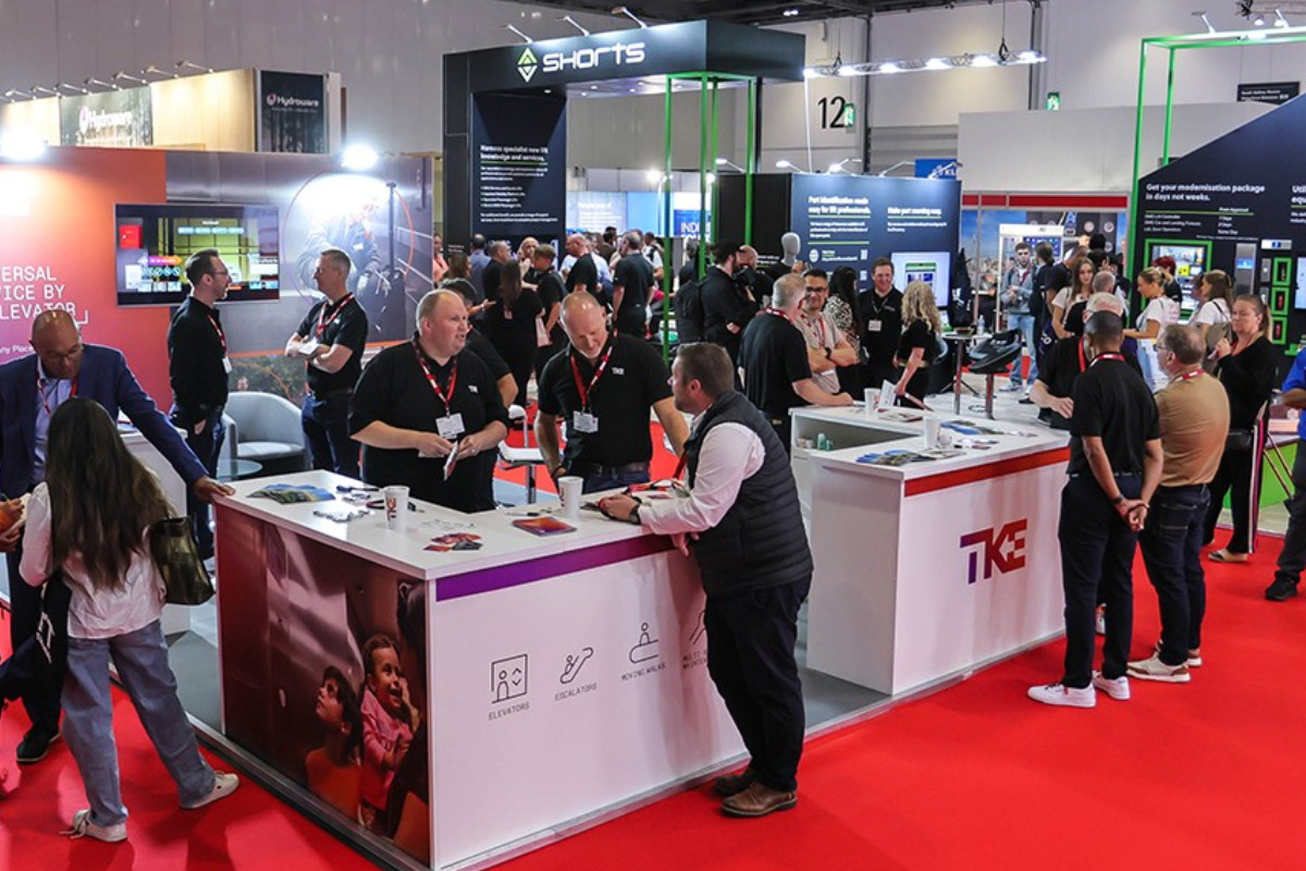 LIFTEX 2025 image People gathering around an exhibition stand at LIFTEX 2025